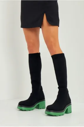 Bottes chaussettes noires à talon vert