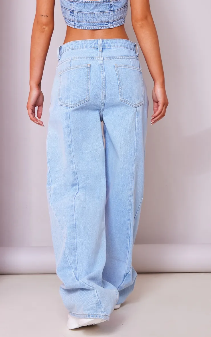 Jean slim large bleu clair délavé détail coutures