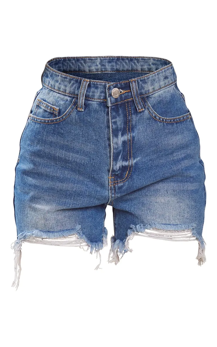 Petite Short en jean bleu foncé délavé déchiré