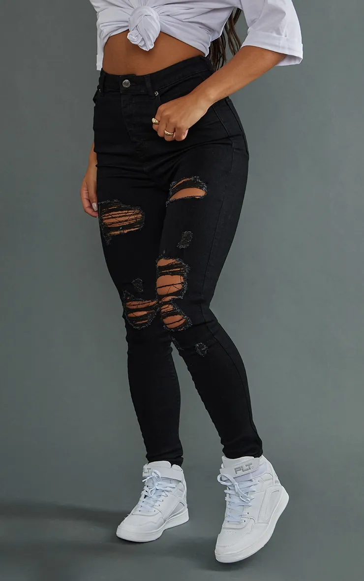 PRETTYLITTLETHING Jean skinny noir usé à 5 poches