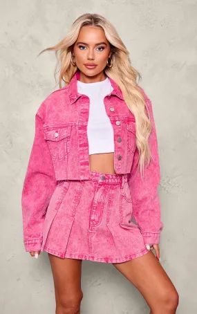 Veste en jean courte rose à ourlet élimé